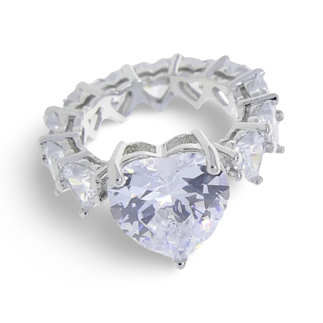 A medium white large heart shaped central cz diamond ring with mini white heart shaped diamonds surrounding the rest of the ring. The ring has silver plating, essentially an all heart ring so no band is showing