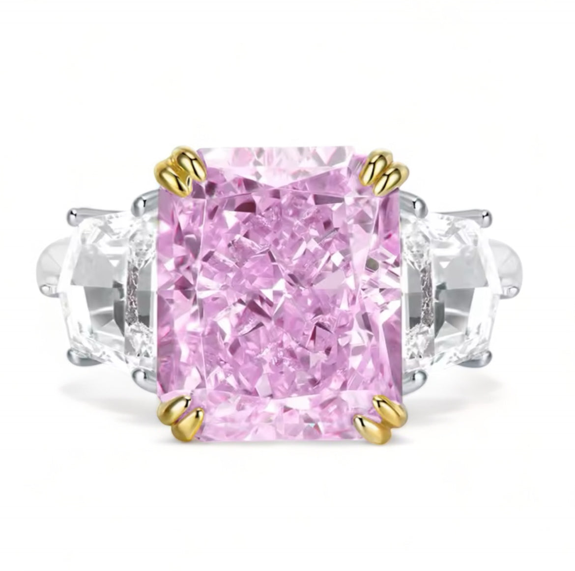 Radiant cut square shaped diamond ring pink central crushed diamond guarded by smaller white diamonds to each side of the ring. This ring also has some minimal gold plating holding the sides of the central pink diamond in place. The rest of the plating of the ring is silver plating. This ring is 925 sterling silver inscribed