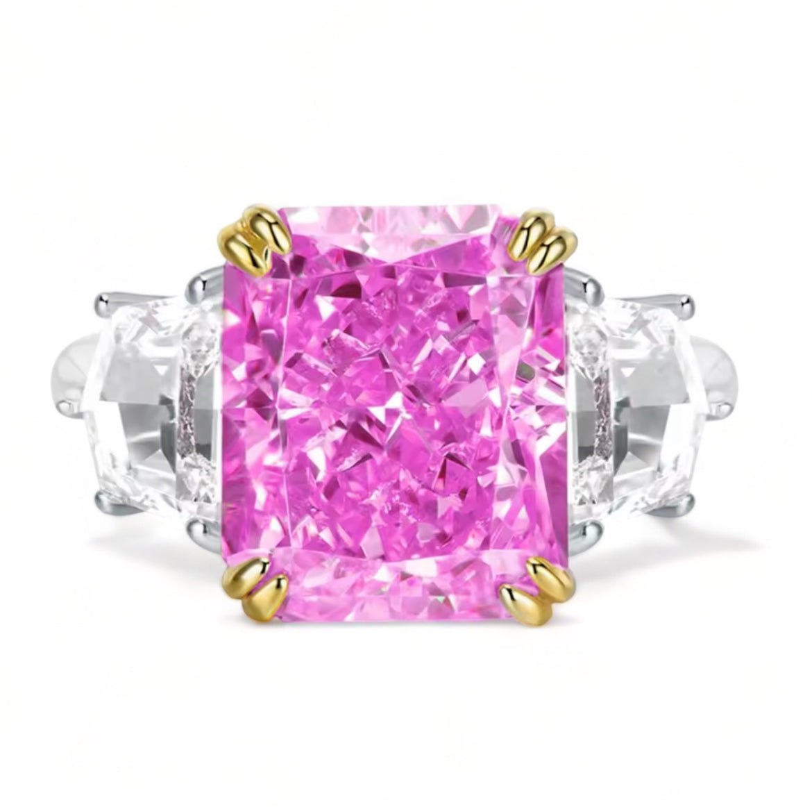 Radiant cut square shaped diamond ring hot pink central crushed diamond guarded by smaller white diamonds to each side of the ring. This ring also has some minimal gold plating holding the sides of the central pink diamond in place. The rest of the plating of the ring is silver plating. This ring is 925 sterling silver inscribed