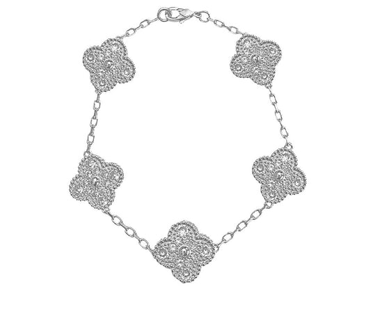 This is a silver 4 leaf clover bracelet 